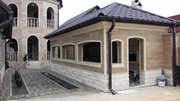 Облицовка фасадов травертином гранитом и мрамором под ключ.