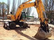 Услуги,  аренда,  заказ колесного экскаватора